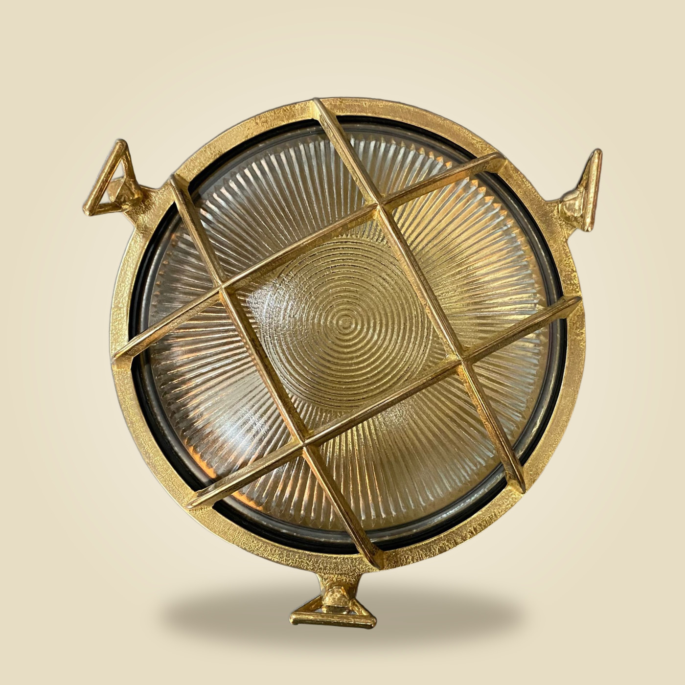 Round Brass Wall Light with Star-Grille & Ribbed Glass Lens — N01